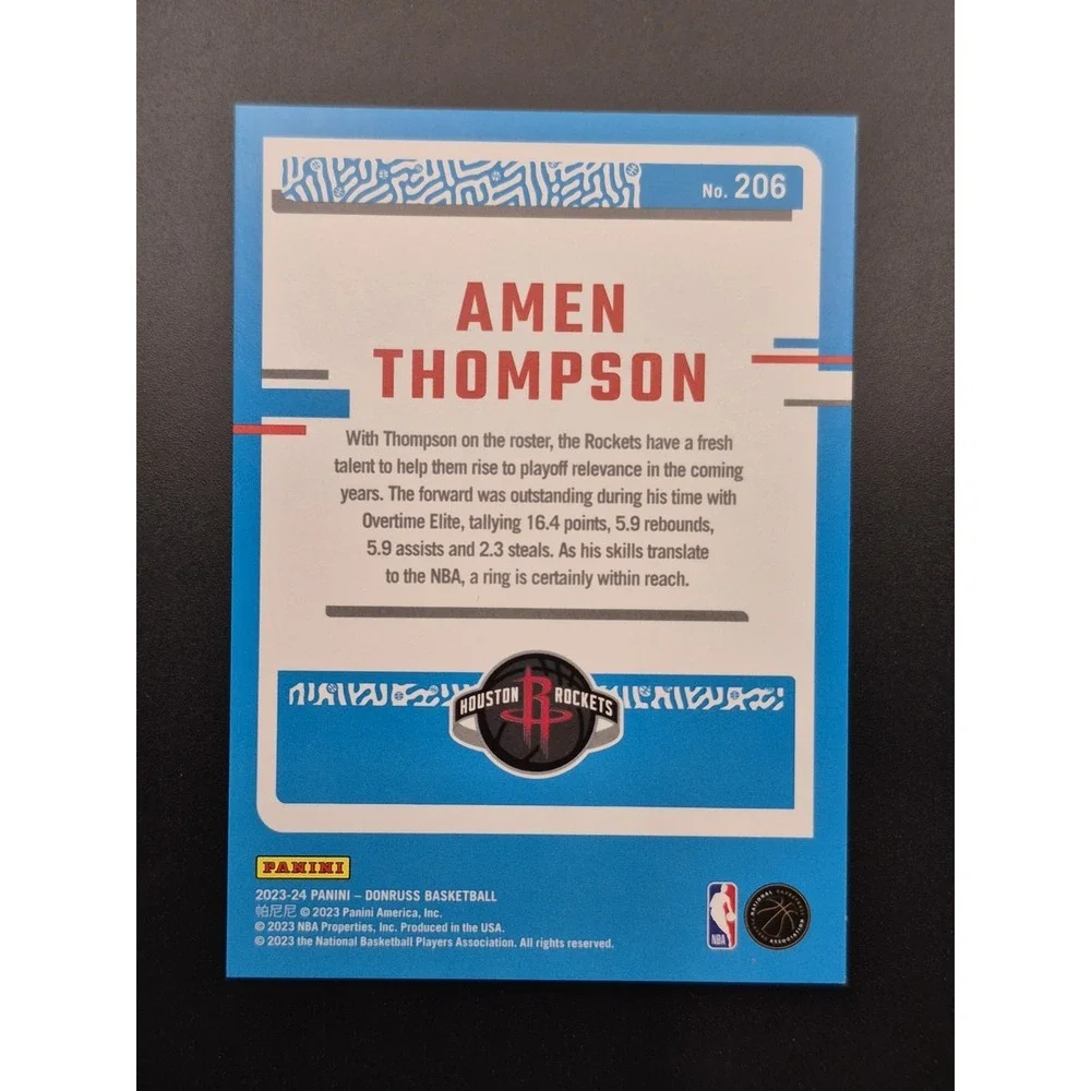 2023 Donruss Amen Thompson #206 Rated Rookie Red & Green Lazer /75 (RC) Rockets